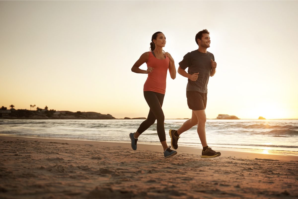 Couple running on the beach
