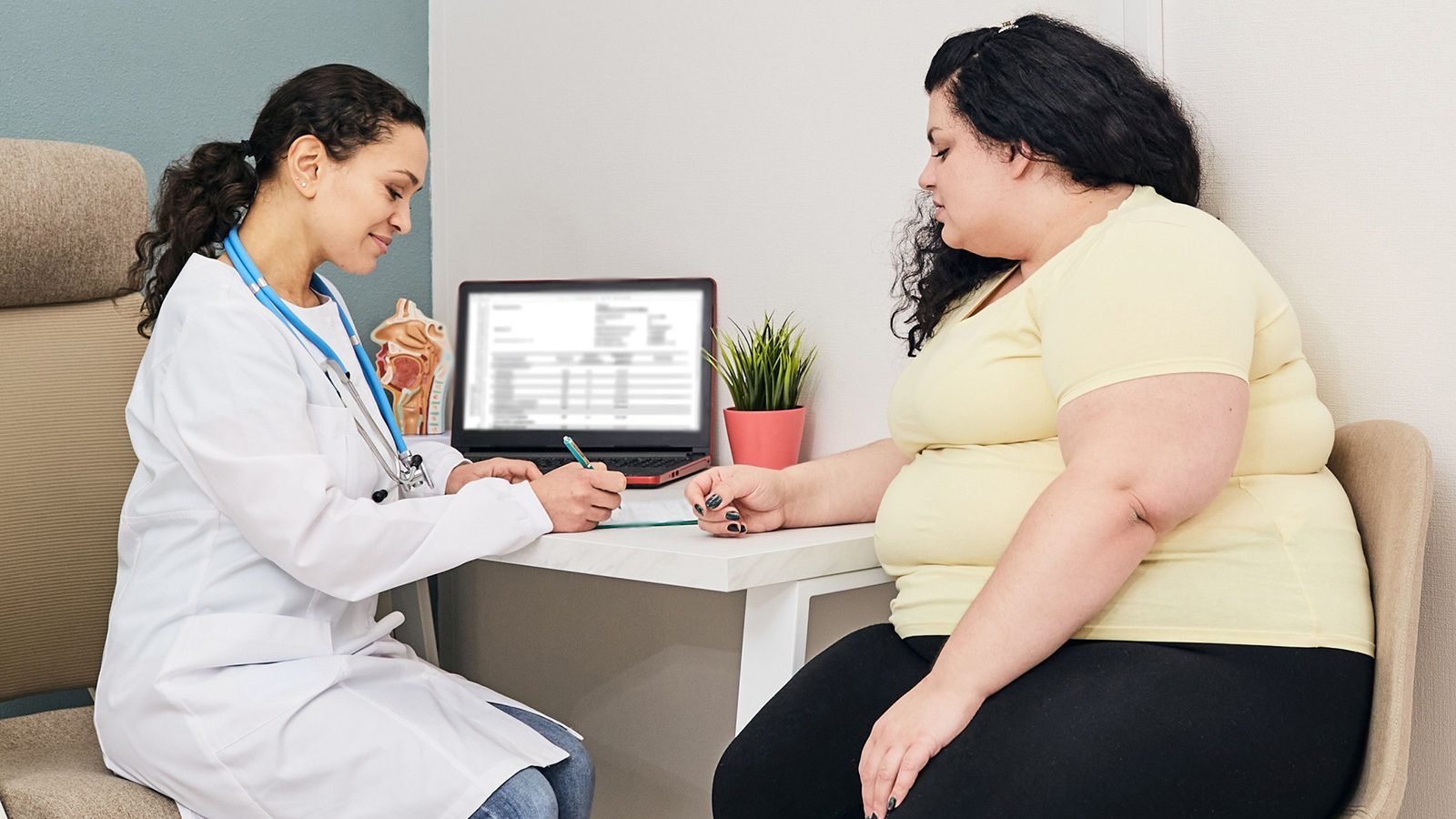 Doctor reviewing a plan with a patient